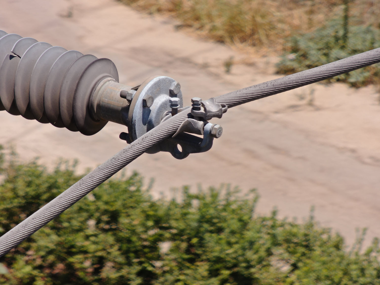 Close-up of a cable reel with a blurred natural background