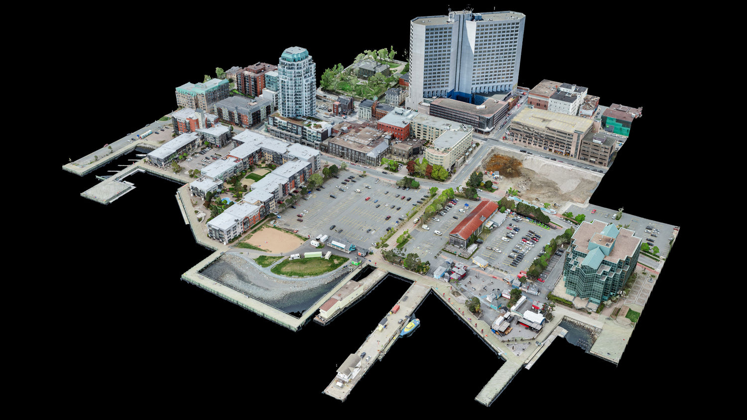 3D model of a city layout with buildings and roads on a black background